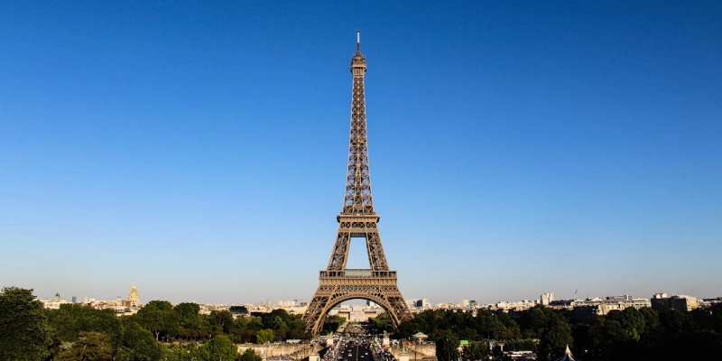 Eiffel Tower in Paris at sunrise with clear sky