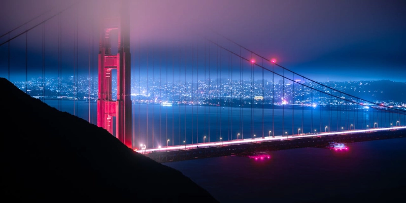 Scenic view of the Golden Gate Bridge from Crissy Field with people biking nearby