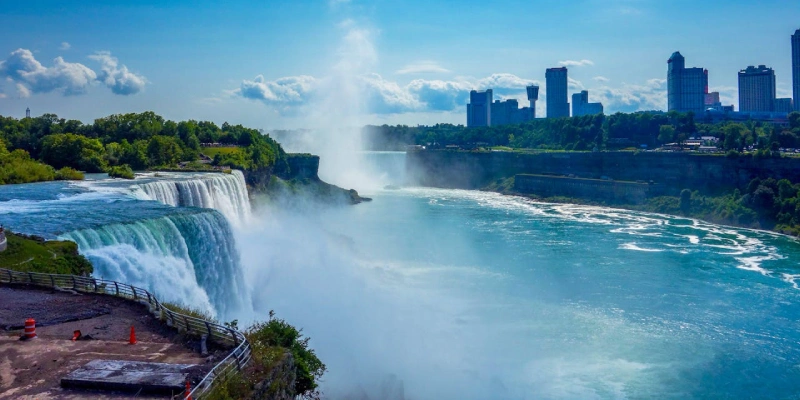 Maid of the Mist boat cruising near the powerful falls at Niagara Falls New York