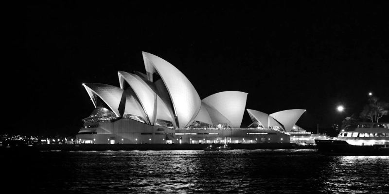 Sydney Opera House at sunrise with waterfront view